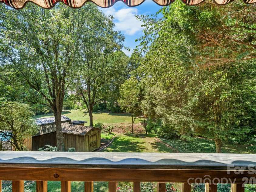 407 10th Street Drive, Hickory, NC 28601.  MLS# CAR4405219, YatesRealty ID 38350. View looking from back deck towards creek.