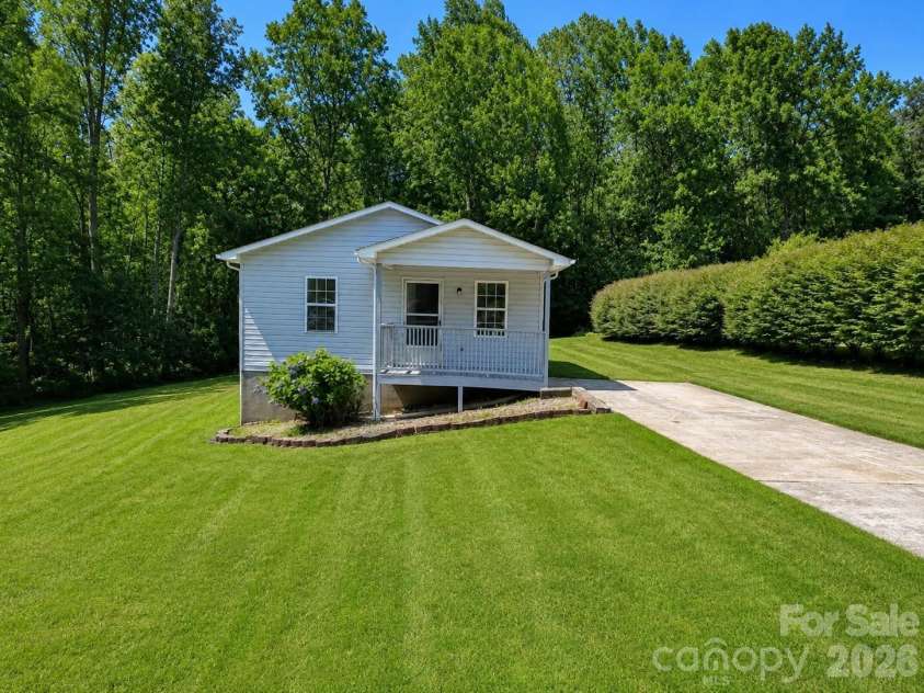 4843 Mayfield Drive, Granite Falls, NC 28630.  MLS# CAR4398784, YatesRealty ID 38352. Yard digitally enhanced.