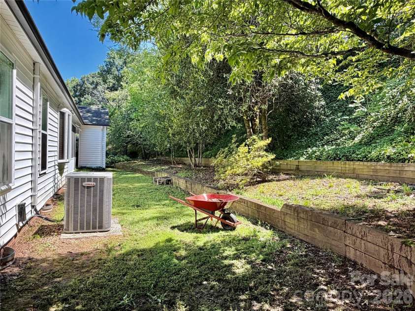 477 Birchwood Trail, Concord, NC 28025.  MLS# CAR4404001, YatesRealty ID 38353. Private Backyard