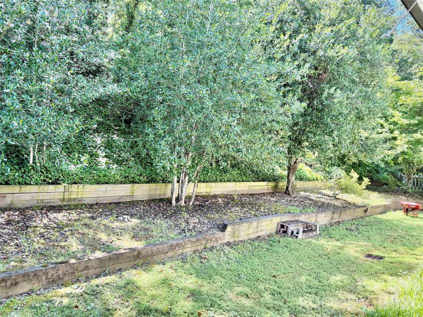477 Birchwood Trail, Concord, NC 28025.  MLS# CAR4404001, YatesRealty ID 38353. Private Backyard