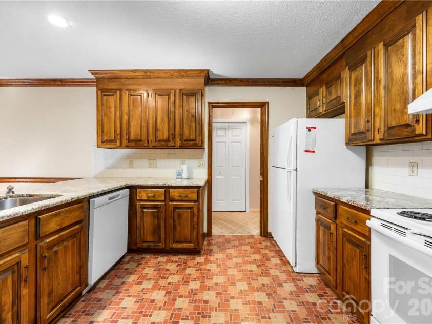 477 Birchwood Trail, Concord, NC 28025.  MLS# CAR4435426, YatesRealty ID 38353. Kitchen II