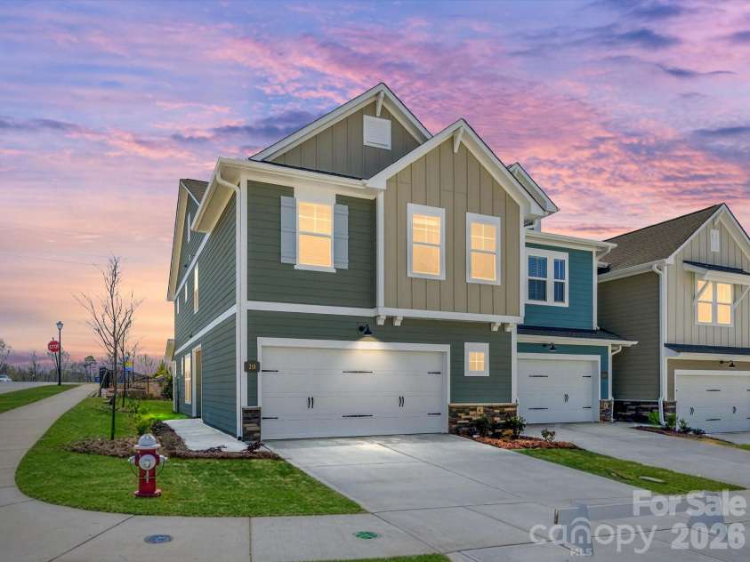 218 Quartz Hill Way, Waxhaw, NC 28173.  MLS# CAR4327162, YatesRealty ID 38355. End townhome with oversized 2 car garage