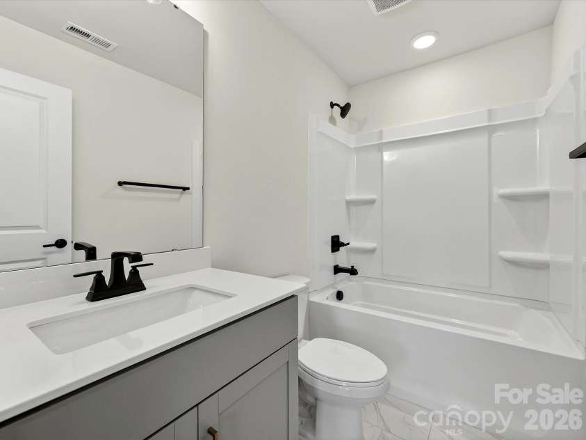 218 Quartz Hill Way, Waxhaw, NC 28173.  MLS# CAR4327162, YatesRealty ID 38355. Hall bathroom