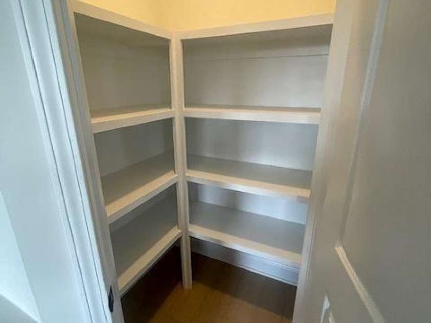 218 Quartz Hill Way, Waxhaw, NC 28173.  MLS# CAR4327162, YatesRealty ID 38355. Large Pantry with solid Shelving