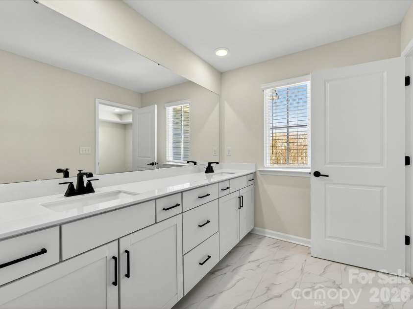 210 Quartz Hill Way, Waxhaw, NC 28173.  MLS# CAR4327857, YatesRealty ID 38356. Oversized dual vanity with quartz .countertops.