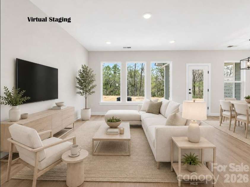 254 Alluvium Lane, Waxhaw, NC 28173.  MLS# CAR4330501, YatesRealty ID 38359. Living Room virtually staged
