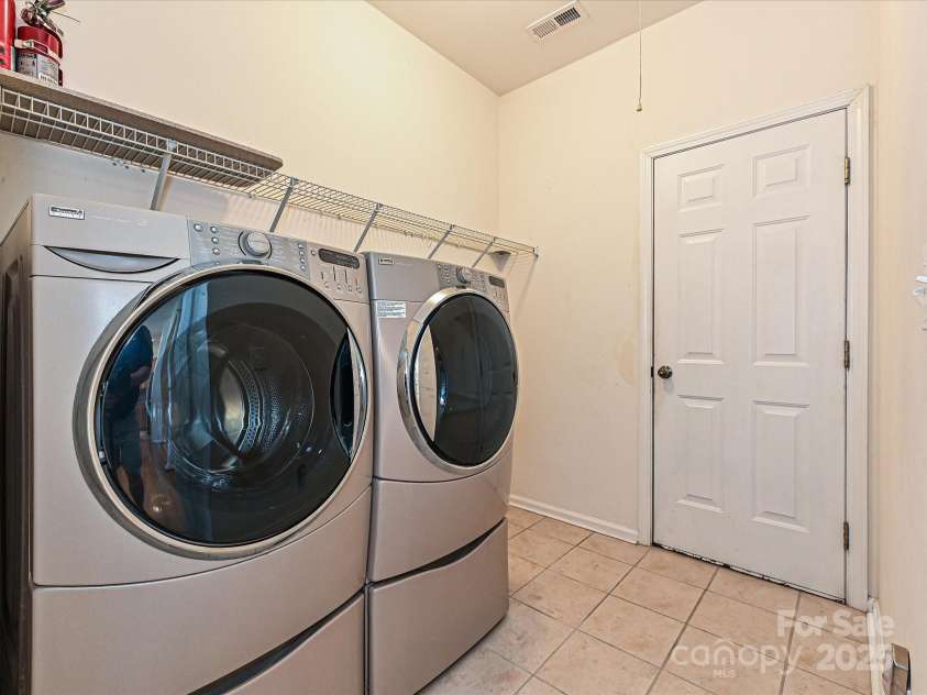 315 Drake Park Avenue, Fort Mill, SC 29708.  MLS# CAR4231306, YatesRealty ID 3836. Laundry Room