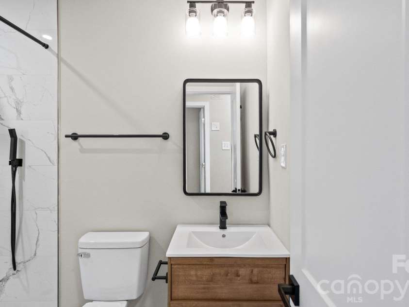708 Aintree Road, Charlotte, NC 28215.  MLS# CAR4434948, YatesRealty ID 38360. Hallway Full Bathroom