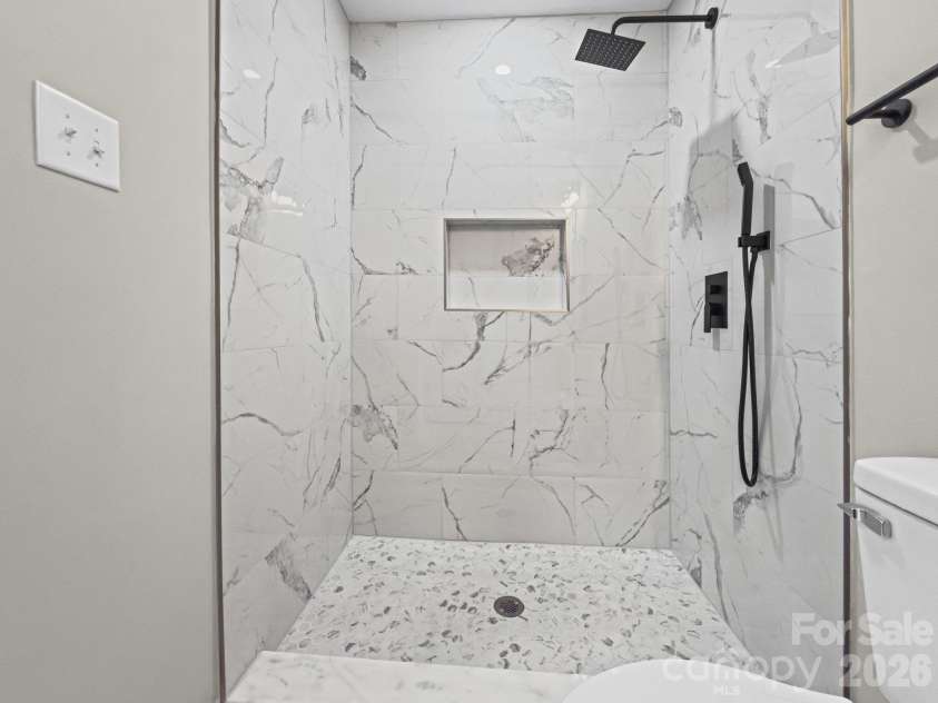 708 Aintree Road, Charlotte, NC 28215.  MLS# CAR4434948, YatesRealty ID 38360. Stunning Tiled Shower