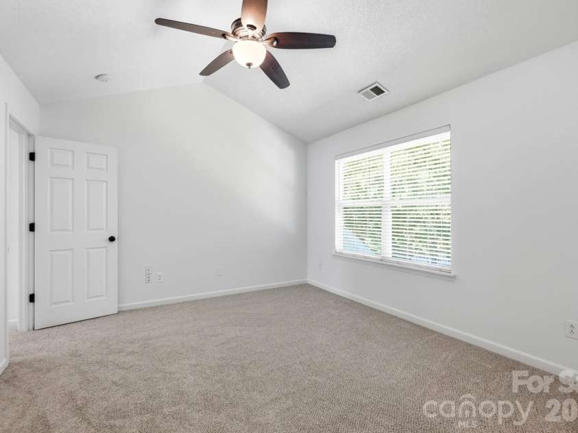 1730 Eagle Ridge Drive, Rock Hill, SC 29732.  MLS# CAR4403986, YatesRealty ID 38364. Bedroom 2 w/vaulted ceiling walk-in closet and ensuite bathroom