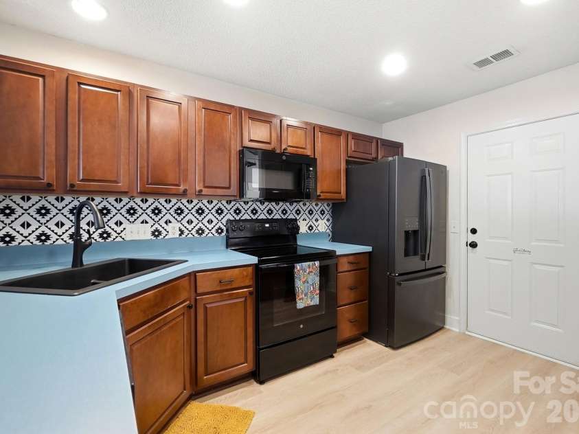 1730 Eagle Ridge Drive, Rock Hill, SC 29732.  MLS# CAR4403986, YatesRealty ID 38364. Kitchen has plenty of cabinets & counterspace, all appliances convey & pantry cabinet (not shown)
