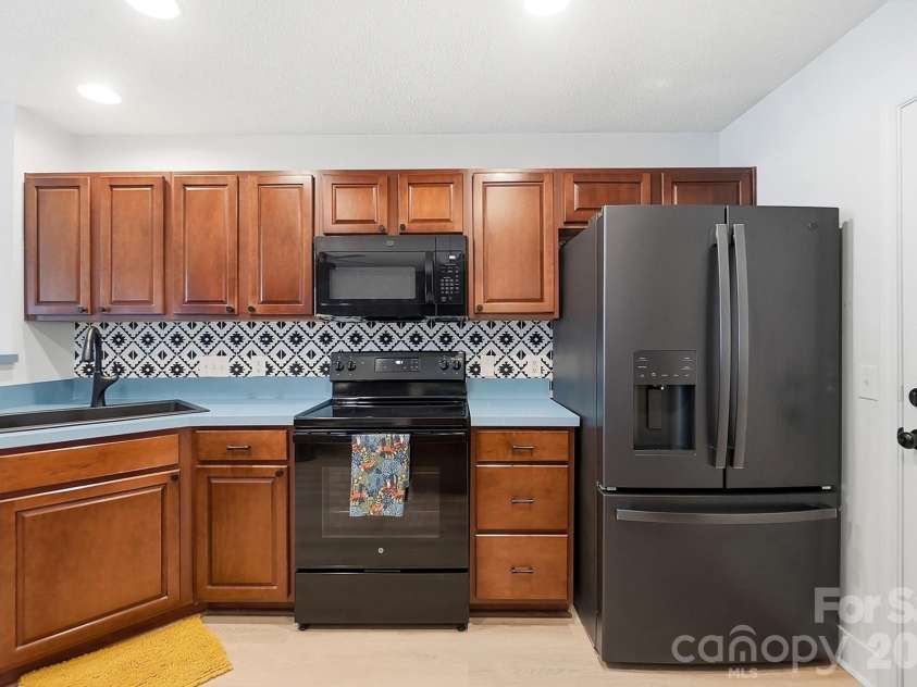 1730 Eagle Ridge Drive, Rock Hill, SC 29732.  MLS# CAR4403986, YatesRealty ID 38364. Kitchen has plenty of cabinets & counterspace, all appliances convey & pantry cabinet (not shown)