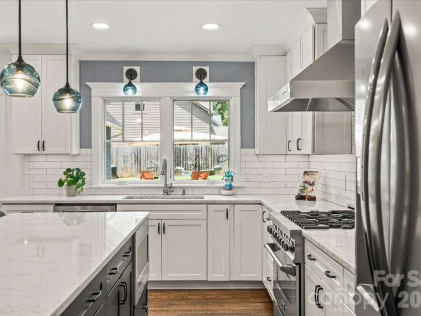 1931 Chatham Avenue, Charlotte, NC 28205.  MLS# CAR4396388, YatesRealty ID 38365. Beautiful design with thoughtful function. An oversized island, walk-in pantry, and six-burner gas range create a kitchen that's ready for everything from quiet mornings to holiday celebrations.