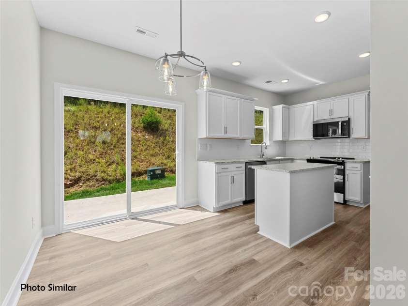 20 Bessie Luther Boulevard, Candler, NC 28715.  MLS# CAR4355456, YatesRealty ID 3837. Identical Floorplan to 18 Bessie Luther. Some finishes vary.
