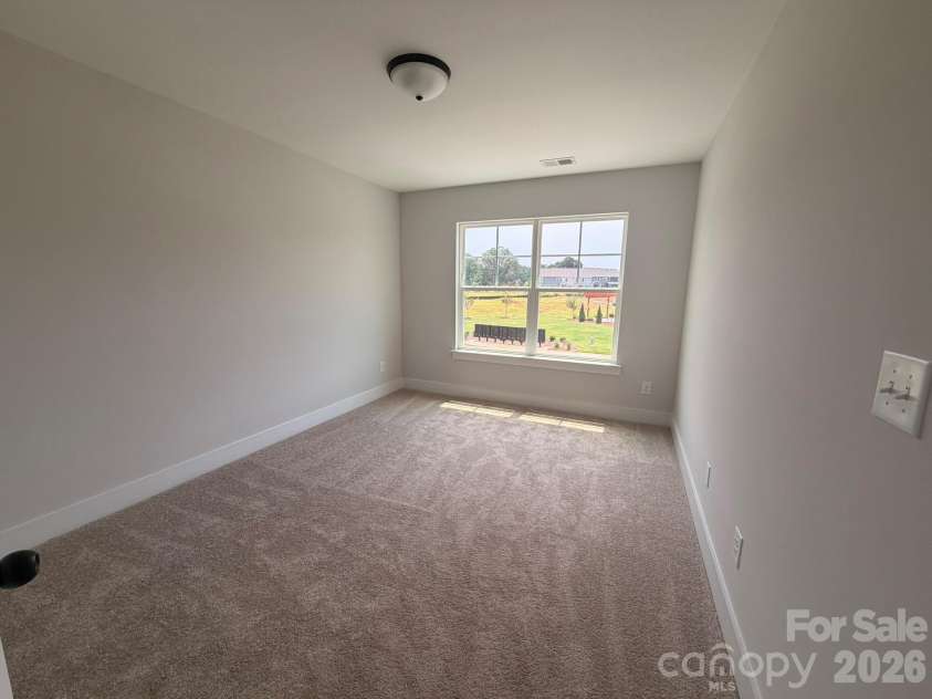 450 Blythe Townhome Lane, Waxhaw, NC 28173.  MLS# CAR4367104, YatesRealty ID 38371. Bedroom 2