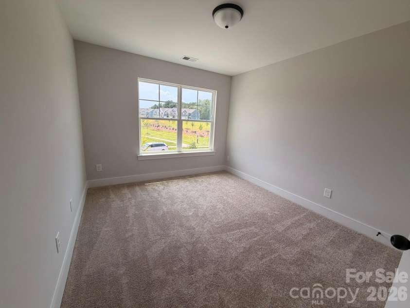 450 Blythe Townhome Lane, Waxhaw, NC 28173.  MLS# CAR4367104, YatesRealty ID 38371. Bedroom 3