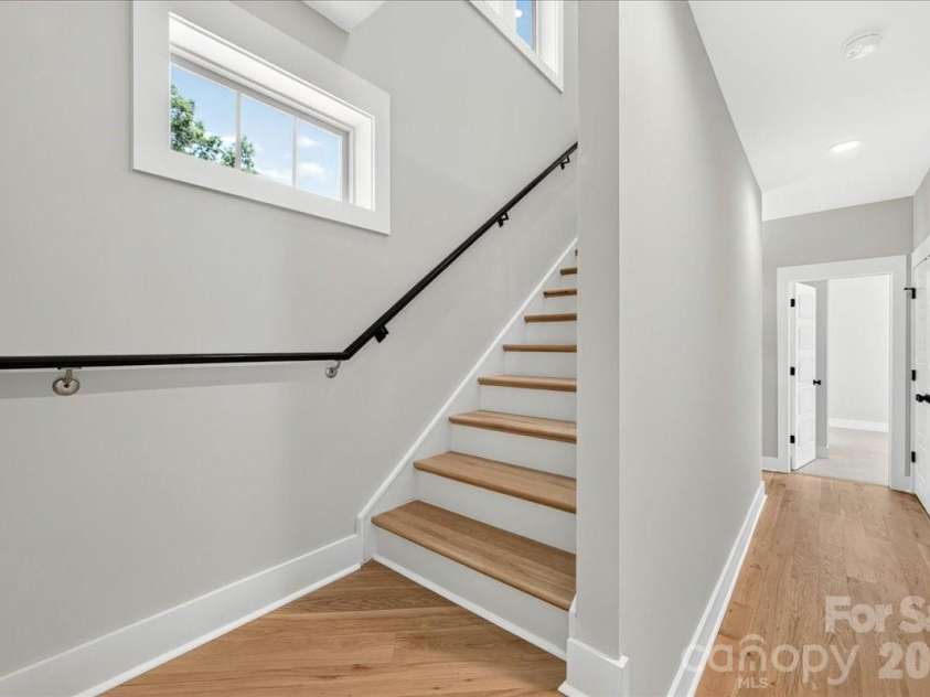 3940 Admiral Avenue, Charlotte, NC 28205.  MLS# CAR4378548, YatesRealty ID 38372. 3rd floor stairway