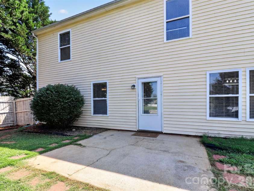 209 Farm Springs Drive, Mount Holly, NC 28120.  MLS# CAR4401410, YatesRealty ID 38377. Back patio