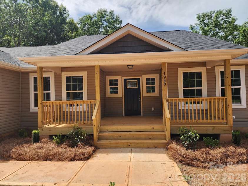 1940 Friendly Lane, Newton, NC 28658.  MLS# CAR4405363, YatesRealty ID 38380. Large Covered Front Porch