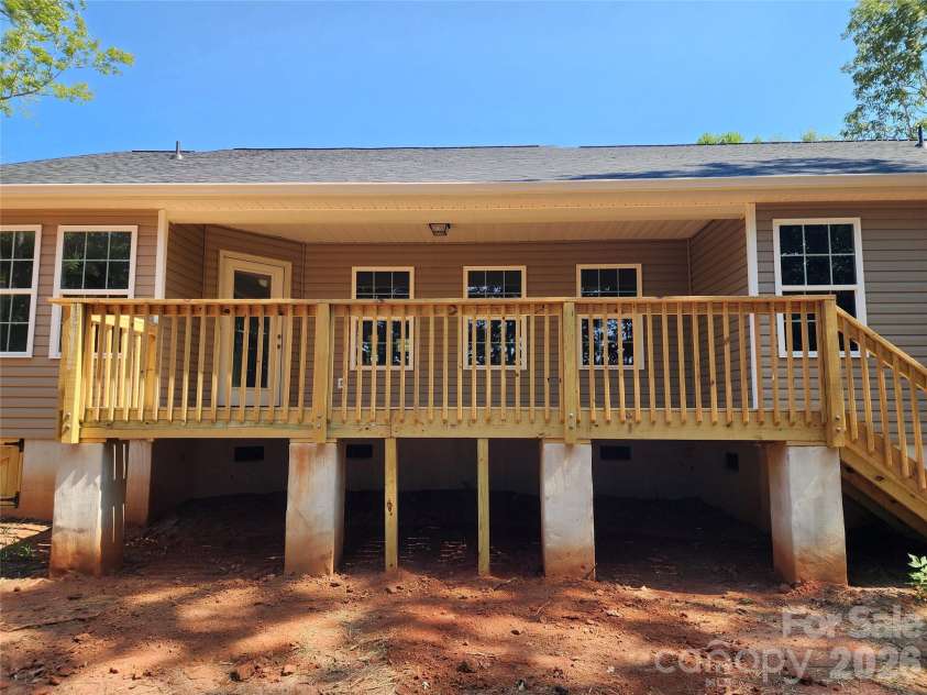 1940 Friendly Lane, Newton, NC 28658.  MLS# CAR4405363, YatesRealty ID 38380. Large Partial Covered Rear Deck