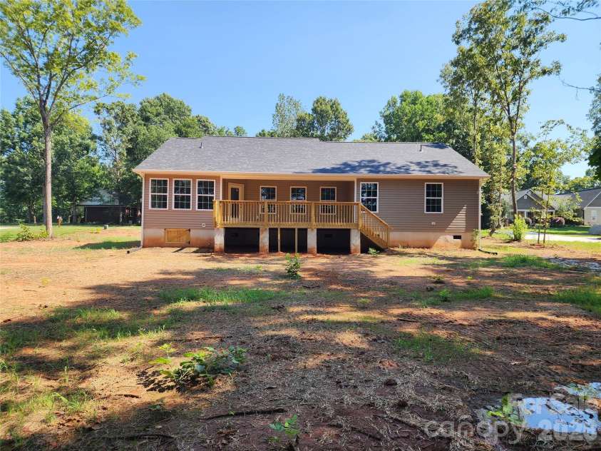 1940 Friendly Lane, Newton, NC 28658.  MLS# CAR4405363, YatesRealty ID 38380. Rear Elev w/Large Partial Covered Rear Deck