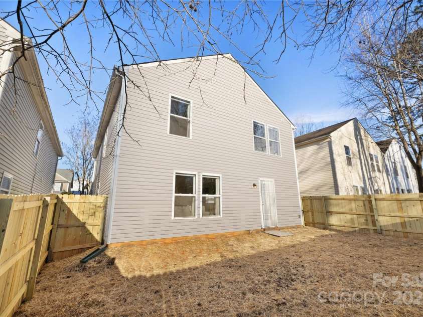 7010 Sycamore Grove Court, Charlotte, NC 28227.  MLS# CAR4213583, YatesRealty ID 3839. Fenced Backyard