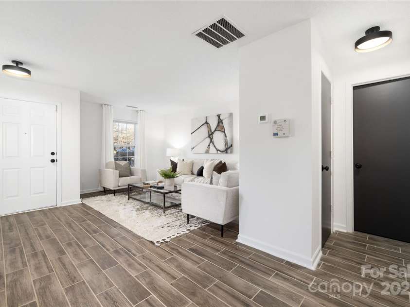 7010 Sycamore Grove Court, Charlotte, NC 28227.  MLS# CAR4213583, YatesRealty ID 3839. Foyer, Formal Living Room and hall to Coat Closet and Powder room