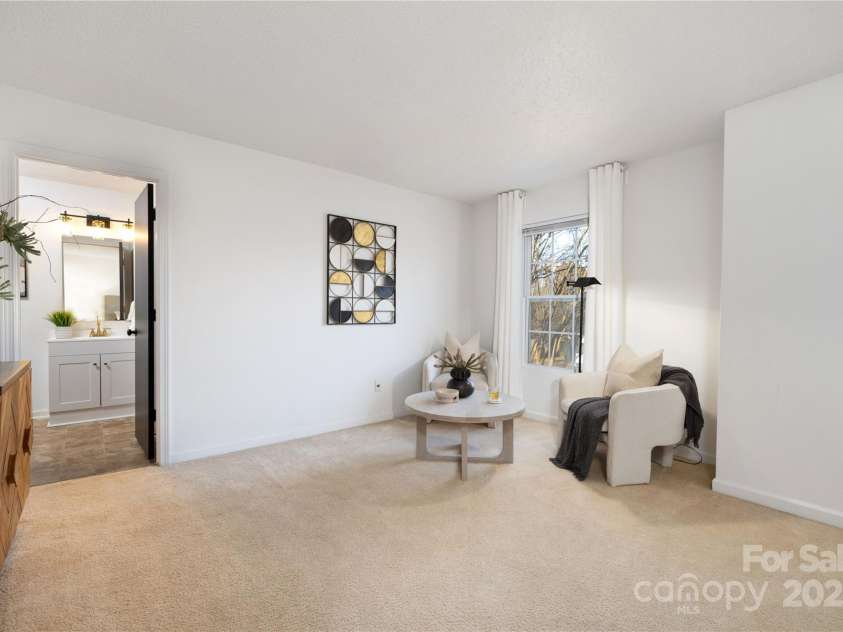 7010 Sycamore Grove Court, Charlotte, NC 28227.  MLS# CAR4213583, YatesRealty ID 3839. Living Area in Spacious Primary Bedroom