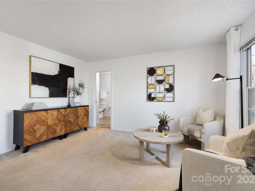 7010 Sycamore Grove Court, Charlotte, NC 28227.  MLS# CAR4213583, YatesRealty ID 3839. Living Area in Spacious Primary Bedroom