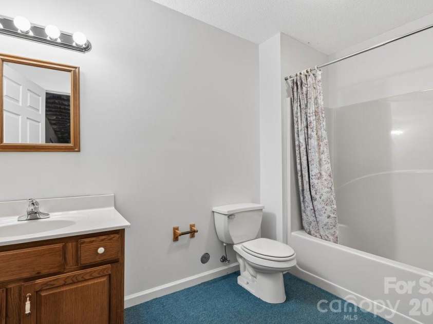 27 Red Maple Drive, Weaverville, NC 28787.  MLS# CAR4389807, YatesRealty ID 38392. Basement full bath