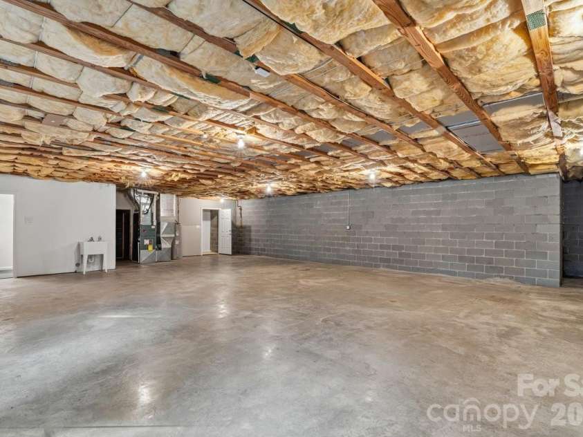 27 Red Maple Drive, Weaverville, NC 28787.  MLS# CAR4389807, YatesRealty ID 38392. Expansive unfinished basement