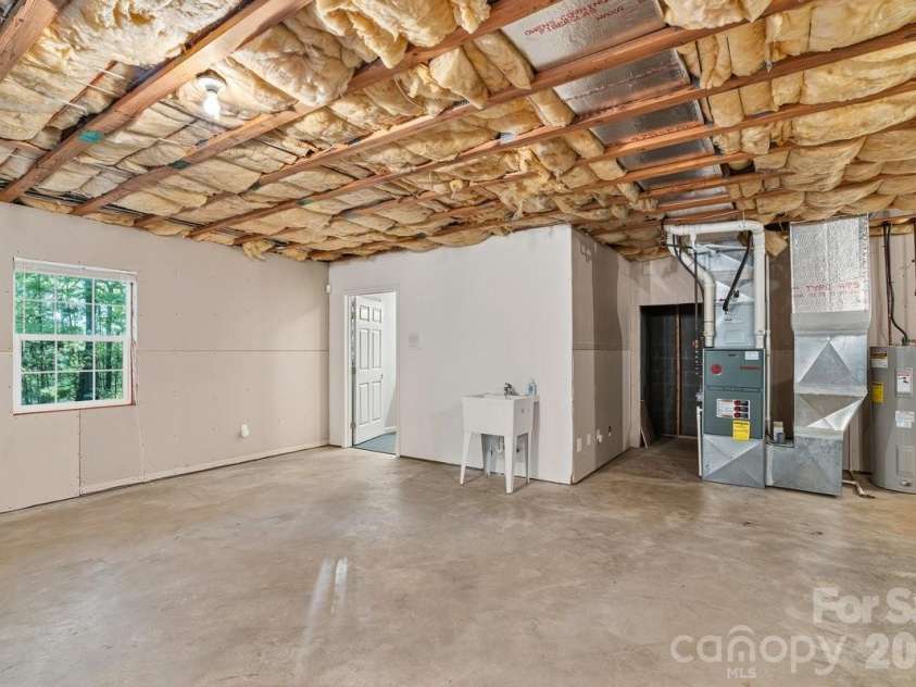 27 Red Maple Drive, Weaverville, NC 28787.  MLS# CAR4389807, YatesRealty ID 38392. Looking toward full bath in basement