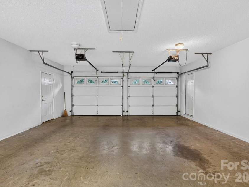 27 Red Maple Drive, Weaverville, NC 28787.  MLS# CAR4389807, YatesRealty ID 38392. Main level 2 car garage