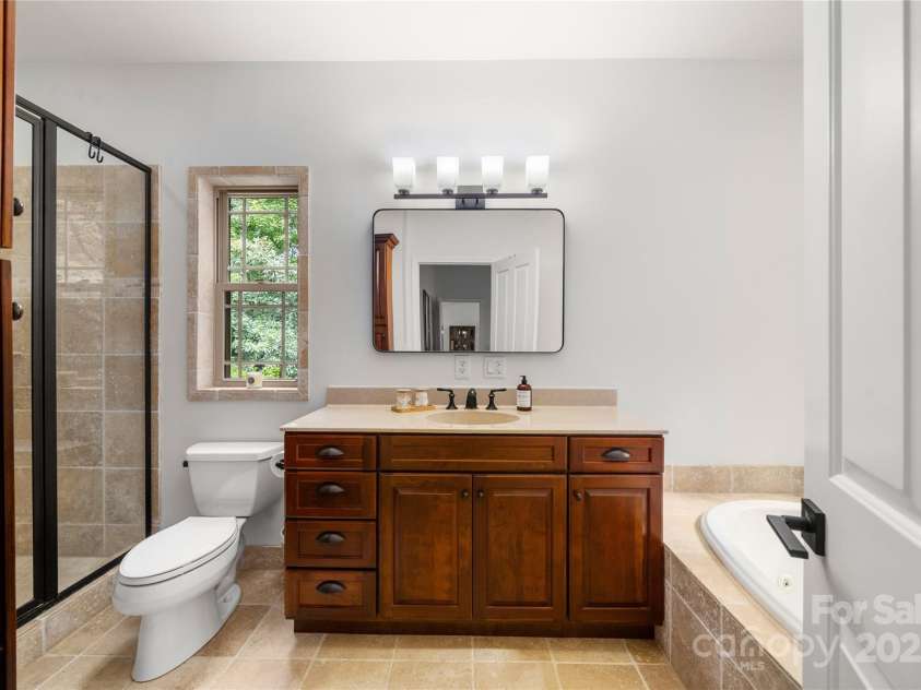 69 Merrell Road, Leicester, NC 28748.  MLS# CAR4181794, YatesRealty ID 3840. Primary Bathroom 2