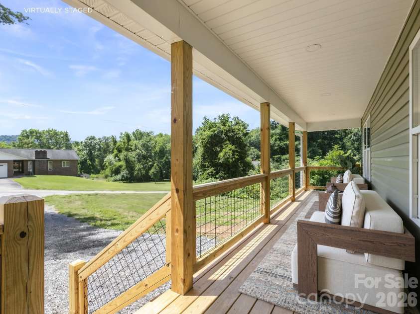 22 Roberts Drive, Candler, NC 28715.  MLS# CAR4405283, YatesRealty ID 38406. 