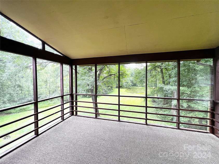 100 View De Lake Drive, Etowah, NC 28729.  MLS# CAR4157217, YatesRealty ID 3841. Huge Screened-In Deck