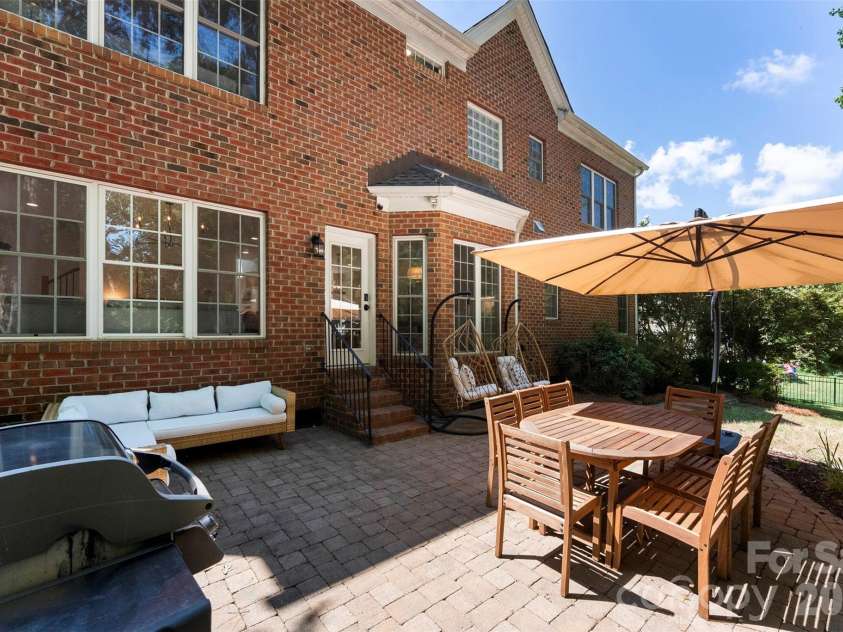 4066 Belle Meade Circle, Belmont, NC 28012.  MLS# CAR4402029, YatesRealty ID 38411. Backyard paver area
