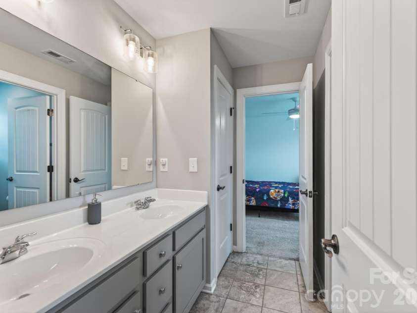 5100 Watercrest Trail, Belmont, NC 28012.  MLS# CAR4387438, YatesRealty ID 38418. Jack and Jill Bathroom