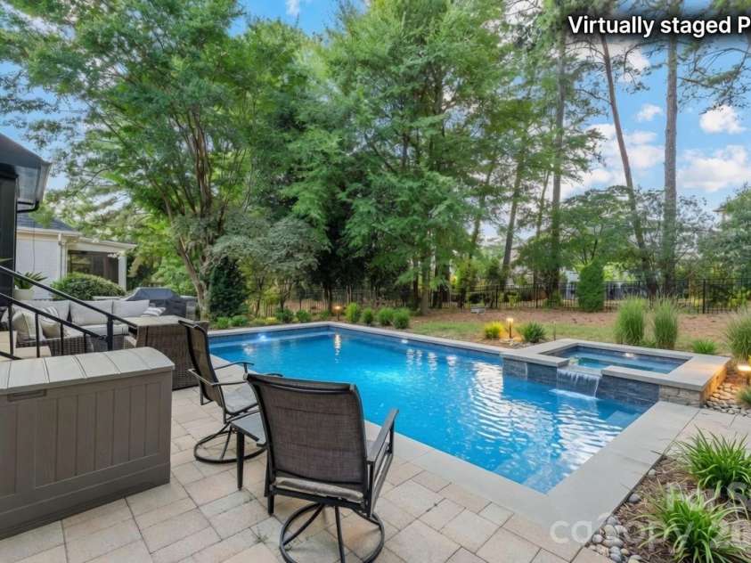 17411 Summer Place Drive, Cornelius, NC 28031.  MLS# CAR4401453, YatesRealty ID 38428. Virtually staged pool concept - rendering illustrates a potential backyard pool; yard is currently open green space.