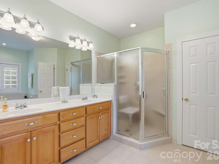 7650 Cotton Street, Harrisburg, NC 28075.  MLS# CAR4393142, YatesRealty ID 38431. Primary Bath