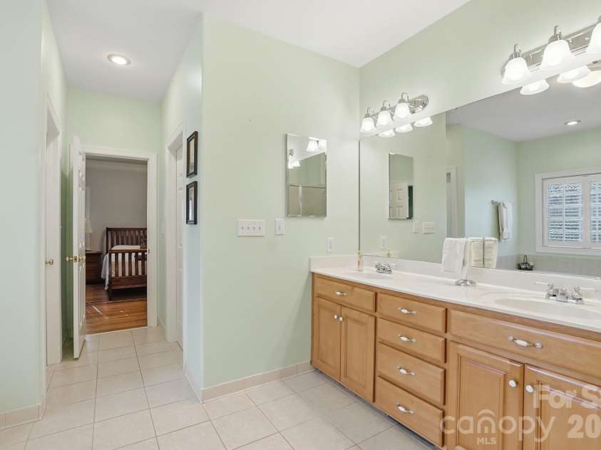 7650 Cotton Street, Harrisburg, NC 28075.  MLS# CAR4393142, YatesRealty ID 38431. Primary Bathroom