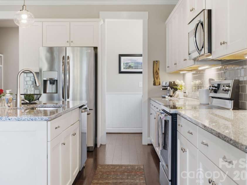 1012 Overlake Drive, Belmont, NC 28012.  MLS# CAR4400980, YatesRealty ID 38441. Lower cabinetry feature glide out shelving