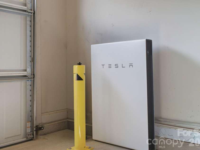 1012 Overlake Drive, Belmont, NC 28012.  MLS# CAR4400980, YatesRealty ID 38441. Tesla back up batter