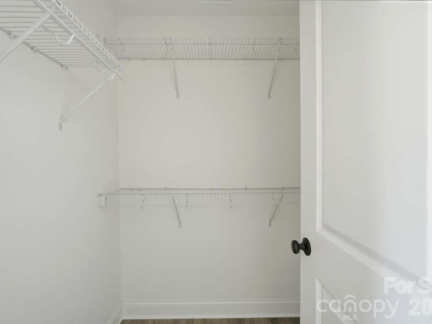 210 8th Avenue Drive, Hickory, NC 28602.  MLS# CAR4400461, YatesRealty ID 38442. Primary Bedroom Walk-In Closet