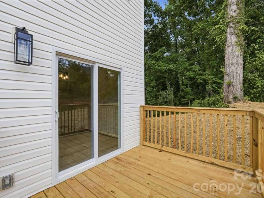 210 8th Avenue Drive, Hickory, NC 28602.  MLS# CAR4400461, YatesRealty ID 38442. Sliders off Dining Room out to the Backyard Deck