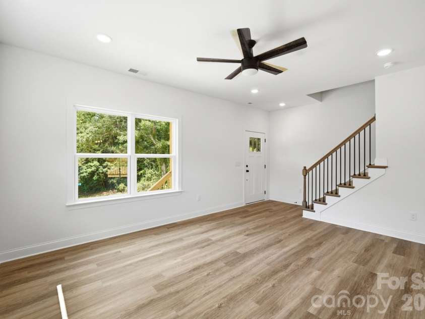 210 8th Avenue Drive, Hickory, NC 28602.  MLS# CAR4400461, YatesRealty ID 38442. View from Kitchen to the Front Door & Stairs to Upper Level