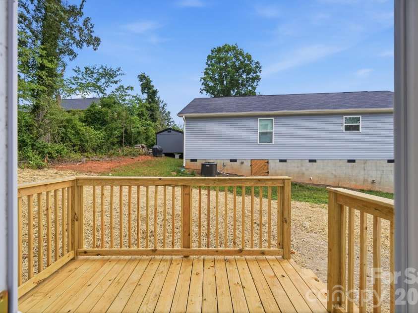 210 8th Avenue Drive, Hickory, NC 28602.  MLS# CAR4400461, YatesRealty ID 38442. View of Deck from Dining Room Sliders