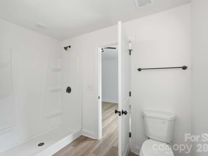 210 8th Avenue Drive, Hickory, NC 28602.  MLS# CAR4400461, YatesRealty ID 38442. Walk-In Shower in Primary Ensuite Bathroom