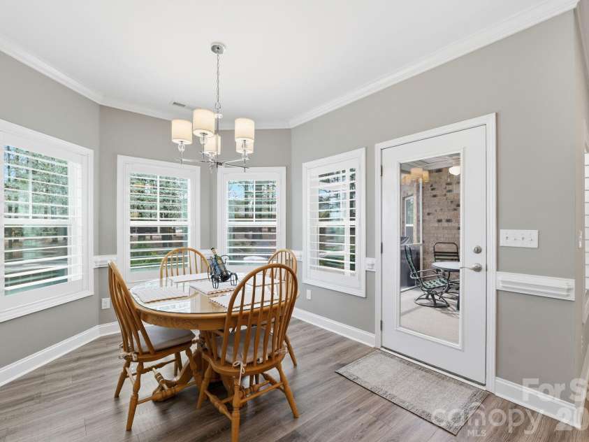 2525 Whispering Way, Indian Trail, NC 28079.  MLS# CAR4356535, YatesRealty ID 3846. Dining area overlooking the back yard
