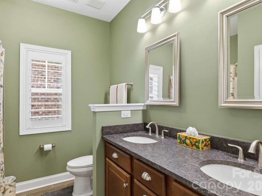 2525 Whispering Way, Indian Trail, NC 28079.  MLS# CAR4356535, YatesRealty ID 3846. Hall bathroom